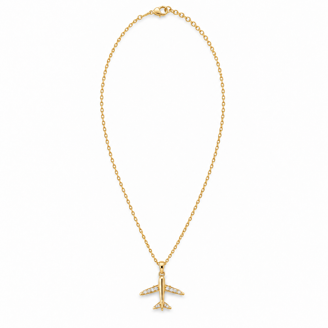Model wearing The Airplane Necklace by Hostess the label, with a gold-plated aeroplane pendant on a fine chain.