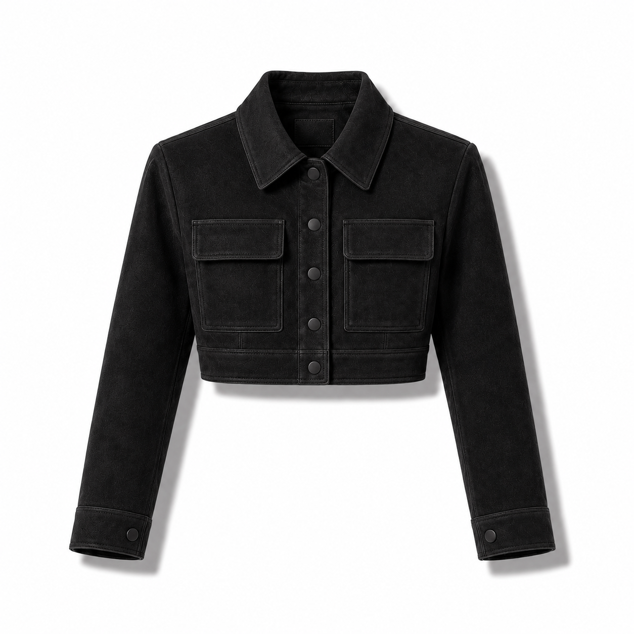 A black cropped denim jacket with a pointed collar, button-front closure, and two flap chest pockets, shown on a clean white background.