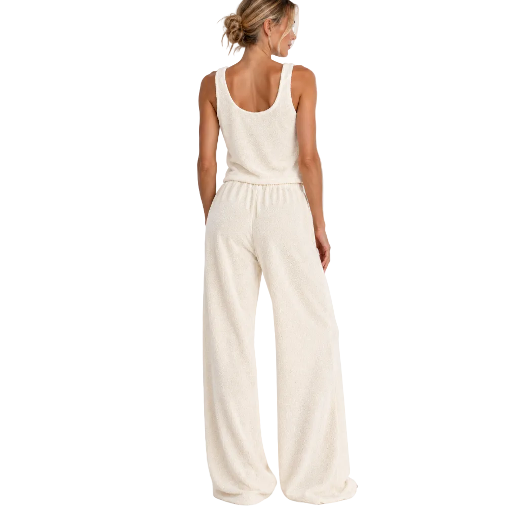 Back view of a model wearing the cream Towelling Loungewear Set, Long, by Hostess the label, showing the scoop-back tank and gathered waistband.