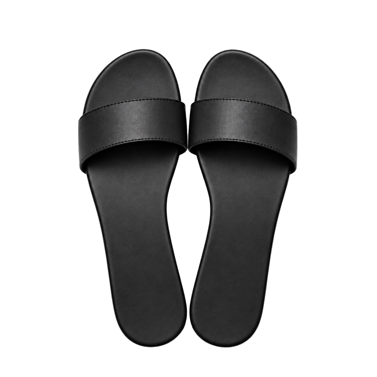 Black leather The Paris Slide sandals by Hostess the label, top view